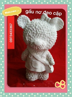 gâu đeo cặp